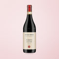 red natural wine bottle on a soft cotton-candy gradient