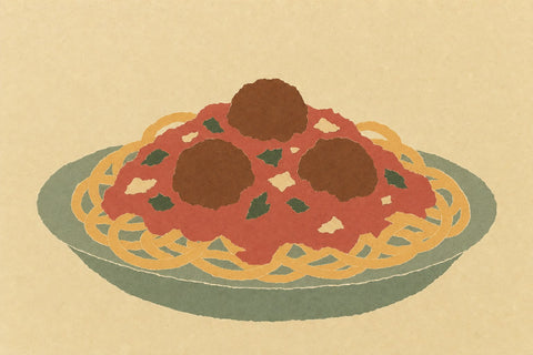 Paper-cutout illustration of a plate of spaghetti with tomato sauce and meatballs