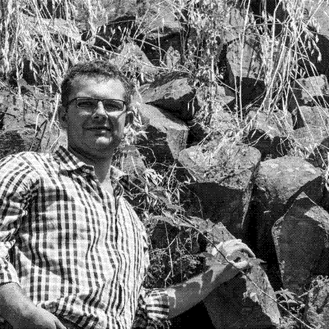 Davide Vignato, natural wine producer, in his volcanic basalt vineyards in Gambellara, Veneto, Italy