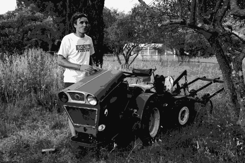 Victor Gourreau of Domaine Hors Ciel with a tractor in the Minervois, Languedoc