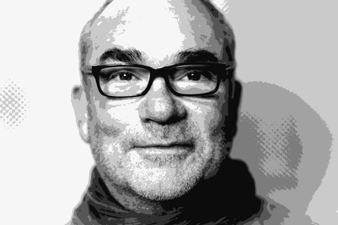 Black and white portrait of Éric Texier, northern Rhône natural wine producer, wearing glasses
