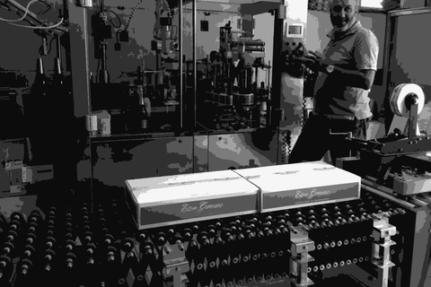 Winemaker Sergio Germano standing at the bottling line in the Ettore Germano cellar