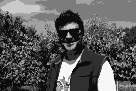 Winemaker Tiago Sampaio of Folias de Baco standing in his Douro vineyard