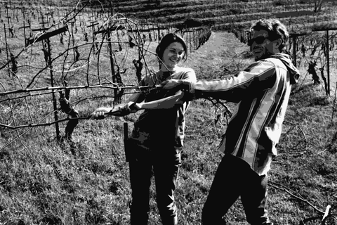 Aaron and Cara Mockrish of Frenchtown Farms pruning vines in their North Yuba vineyard