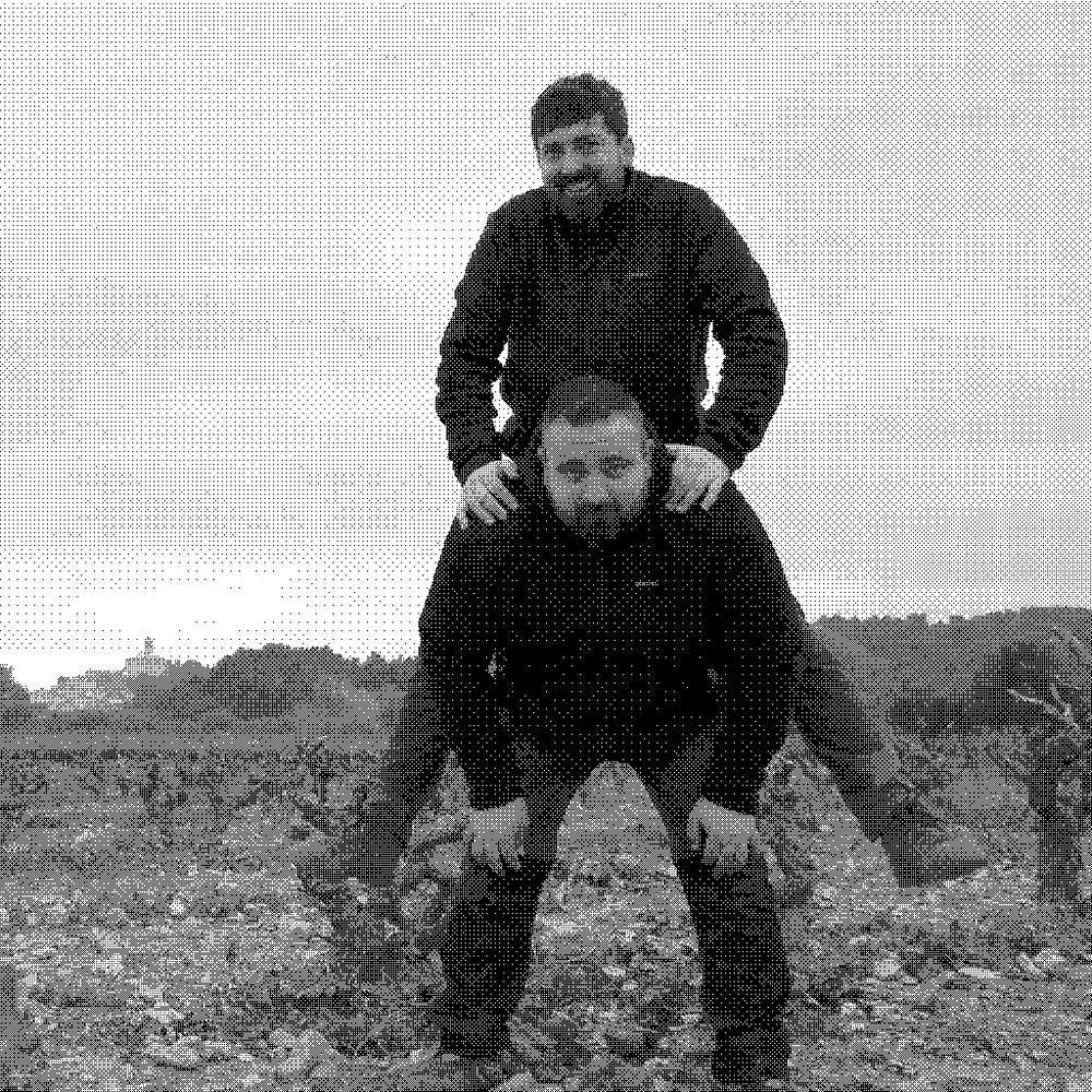 Francesc and Joan Ferré of Celler Frisach, natural wine producer in Terra Alta, Catalonia, Spain, standing among old vines in Corbera d'Ebre
