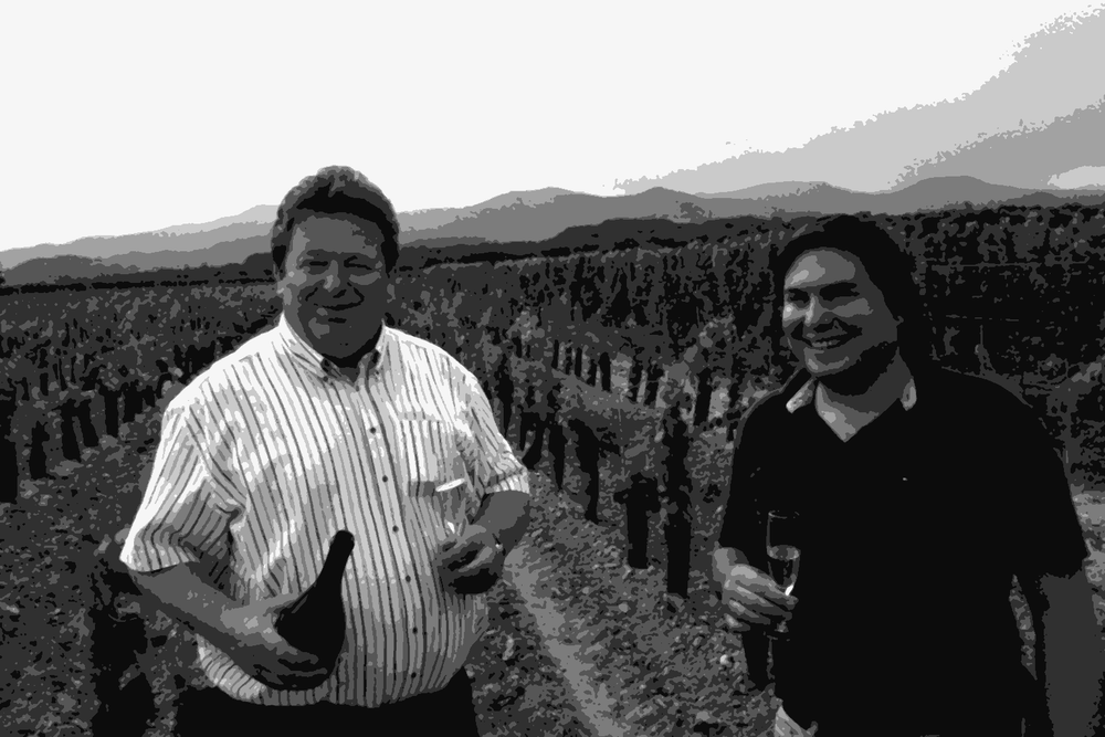Jacques Cattin and his son Jacques Cattin Jr in the family vineyards at Voegtlinshoffen, Alsace, holding glasses of Cremant