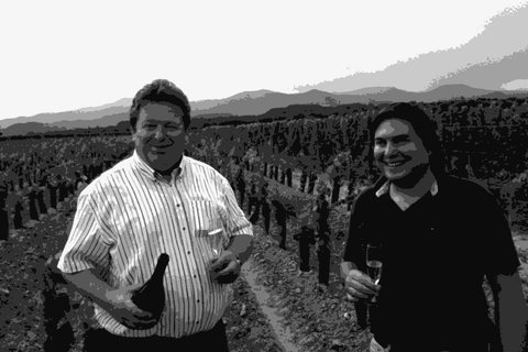 Jacques Cattin and his son Jacques Cattin Jr in the family vineyards at Voegtlinshoffen, Alsace, holding glasses of Cremant