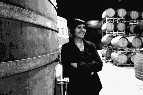 Austrian biodynamic winemaker Judith Beck in her cellar in Gols, Burgenland, beside large oak casks and barrels