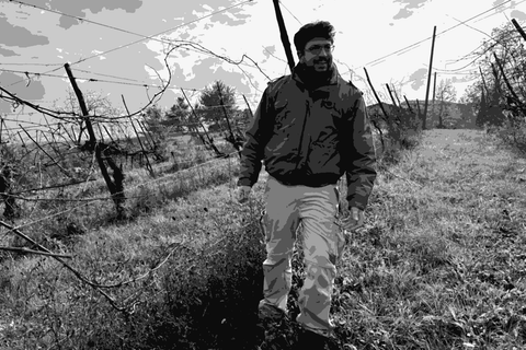 Flavio Restani of Koi standing in his vineyard