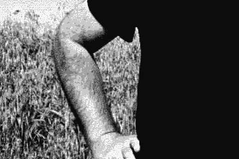 Filippo Rizzo of Lamoresca standing in a field in central Sicily