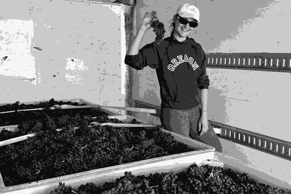 Megan Sekermestrovich of Lula holding freshly harvested Valdiguié grapes at the Richmond Wine Collective