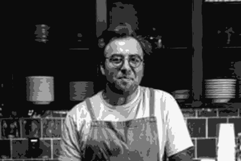 Ross Maloof standing at the kitchen counter of No Clos Radio, Forest Grove, Oregon