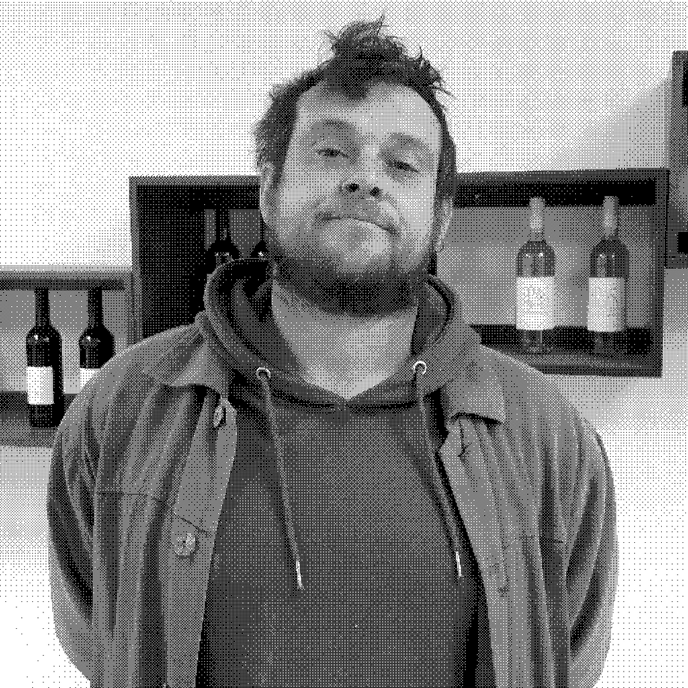 Julien Trichard, natural wine producer, in his cellar at Mas Pas Re in Vendémian, Languedoc, France