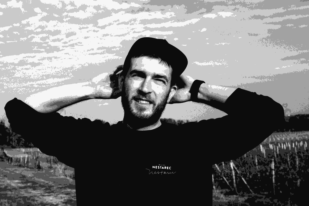 Milan Nestarec in his vineyard in Velke Bilovice, South Moravia, wearing a black cap and sweatshirt with his name on it