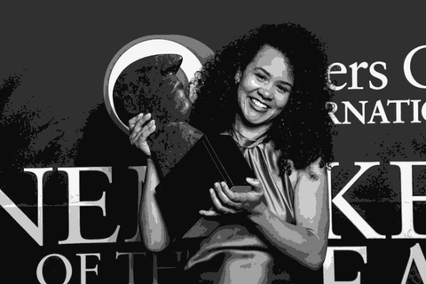 Kiara Scott-Farmer holding her 2024 Diners Club Winemaker of the Year trophy