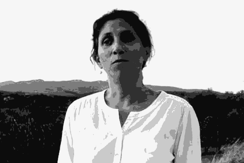 Giovanna Tiezzi of Pàcina standing in her vineyards near Castelnuovo Berardenga, Tuscany