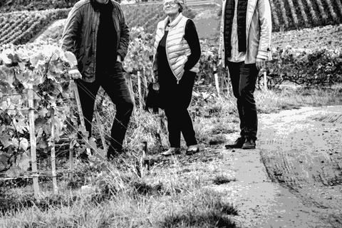 The Bonnaire family, owners of Paul Clouet Champagne, standing in their Grand Cru vineyard in Bouzy