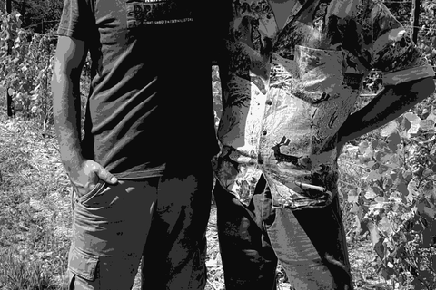 Daniele (left) and Marco Filippini standing together in the Siemàn vineyard, smiling