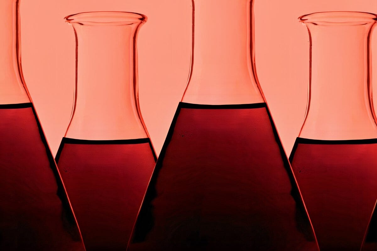 Some decanters with red wine in it, unfiltered wine natural wine blog.