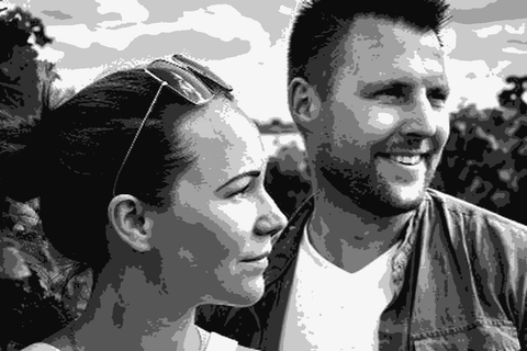 Bianka and Daniel Schmitt, winemakers at Weingut Schmitt, in a close-up portrait outdoors among the vines