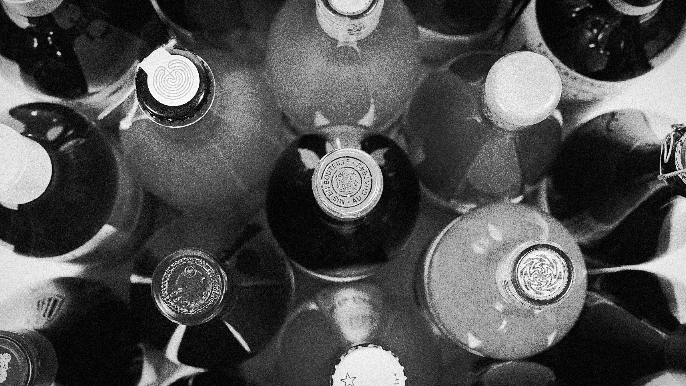 Natural wine bottles photographed from above, Primal Wine Natural Wine Club