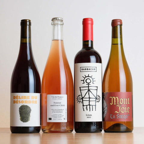 Photo of a series of natural wine bottles that will ship as a wine club through primalwine.com